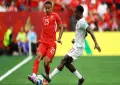Switzerland defeat Canada as both reach last 32