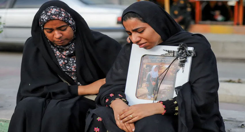 People mourn on the day of the mass funeral for the victims of a strike on a school in Minab, Iran, amid the US-Israeli war on the country, March 3, 2026. Reuters