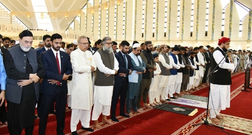 Worshippers prepare to offer Eid-ul-Fitr prayers at Islamabad mosques.