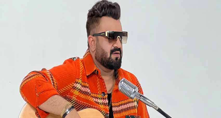 Pakistani musician Sahir Ali Bagga plays guitar.