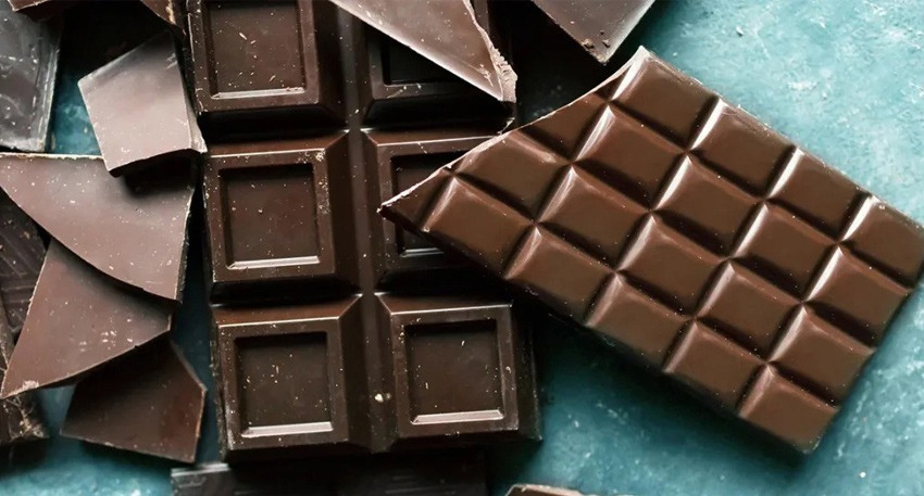 Dark chocolate contains flavonoids that may support healthy blood pressure levels when consumed in moderation.