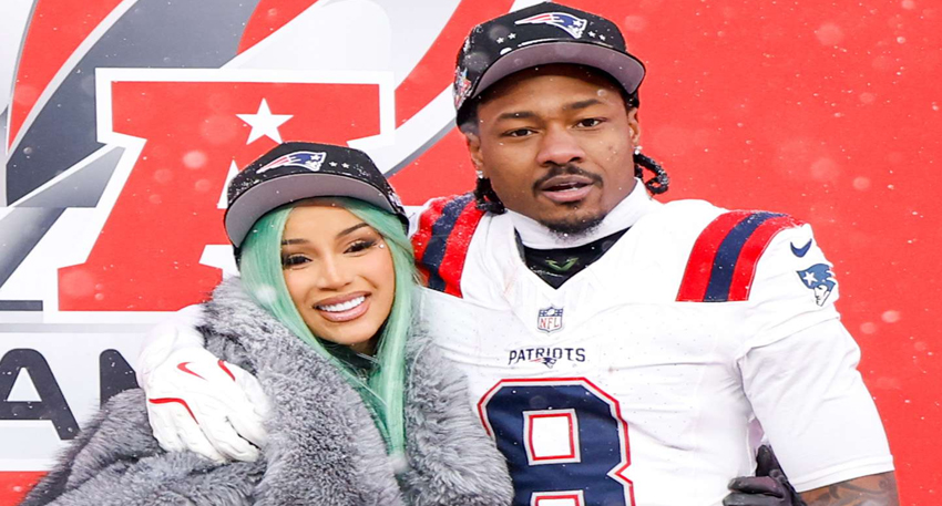 Cardi B and Stefon Diggs in New England Patriots gear, smiling together in front of a red background.