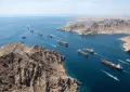 Two ships sink after attacks near the Strait of Hormuz