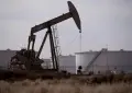 Oil prices fall as traders weigh supply risks and Middle East tensions