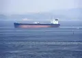 Iran reports explosion as oil supertanker hit naval mine in Strait of Hormuz