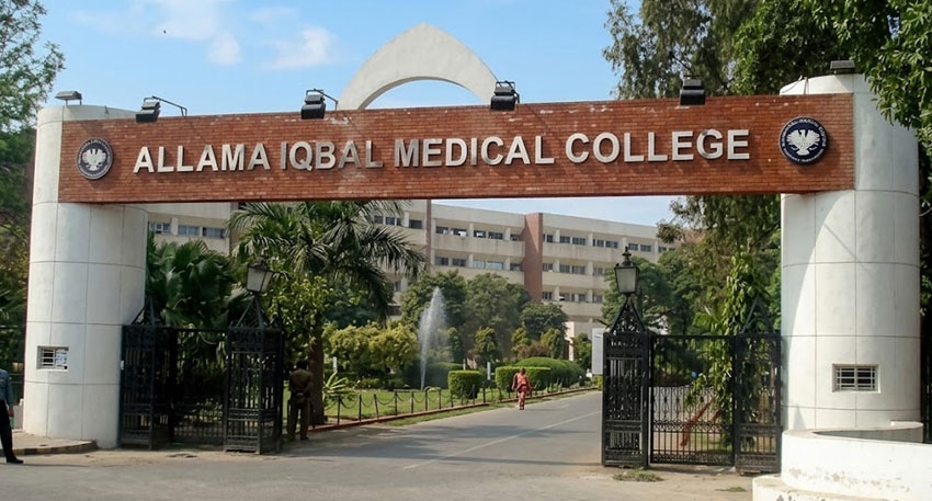 Entrance gate of Allama Iqbal Medical College in Lahore with a large brick and metal sign.