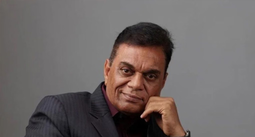 Late Indian TV producer B.P. Singh posing with his hand on his chin.