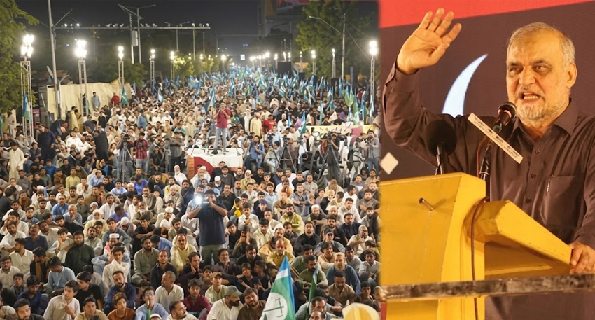 Hafiz Naeem ur Rehman addresses a large Jamaat-e-Islami sit-in crowd at night in Lahore.