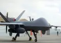 Iran displays downed US MQ-9 drone after fresh strikes