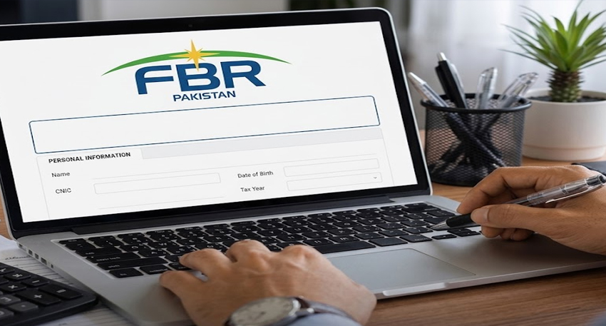 Laptop showing FBR Pakistan IRIS tax return portal.