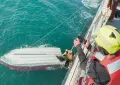 Boy rescued after days on capsized boat in Alaska waters
