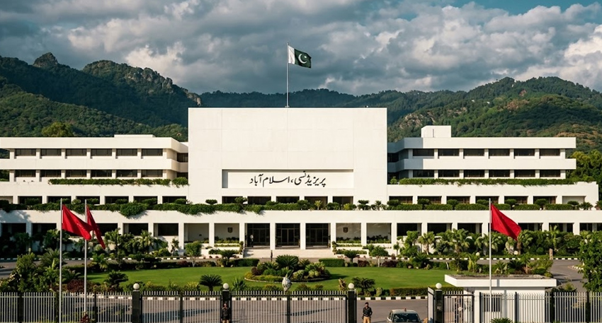 Aiwan-e-Sadr, the President House in Islamabad, Pakistan, with the national flag flying under a cloudy sky.